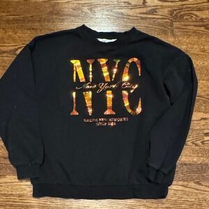 H&M NYC Shiny Sweatshirt Size 10-12, fits like a women’s medium